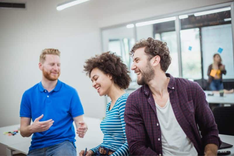 Happy friends in an office